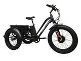 The Black electric Fat Trike with matching black fenders, and a large rear basket with a dry bag